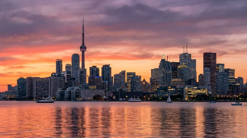 Toronto skyline at sunset with the CN Tower